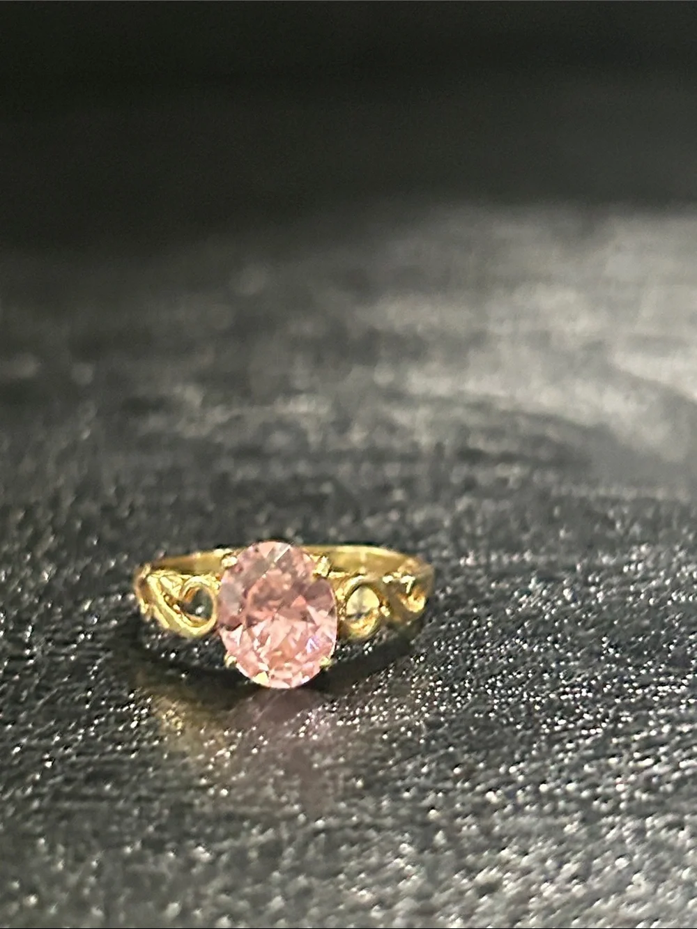 Vintage Gold Ring with Pink Oval Stone and Decorative Shoulders
